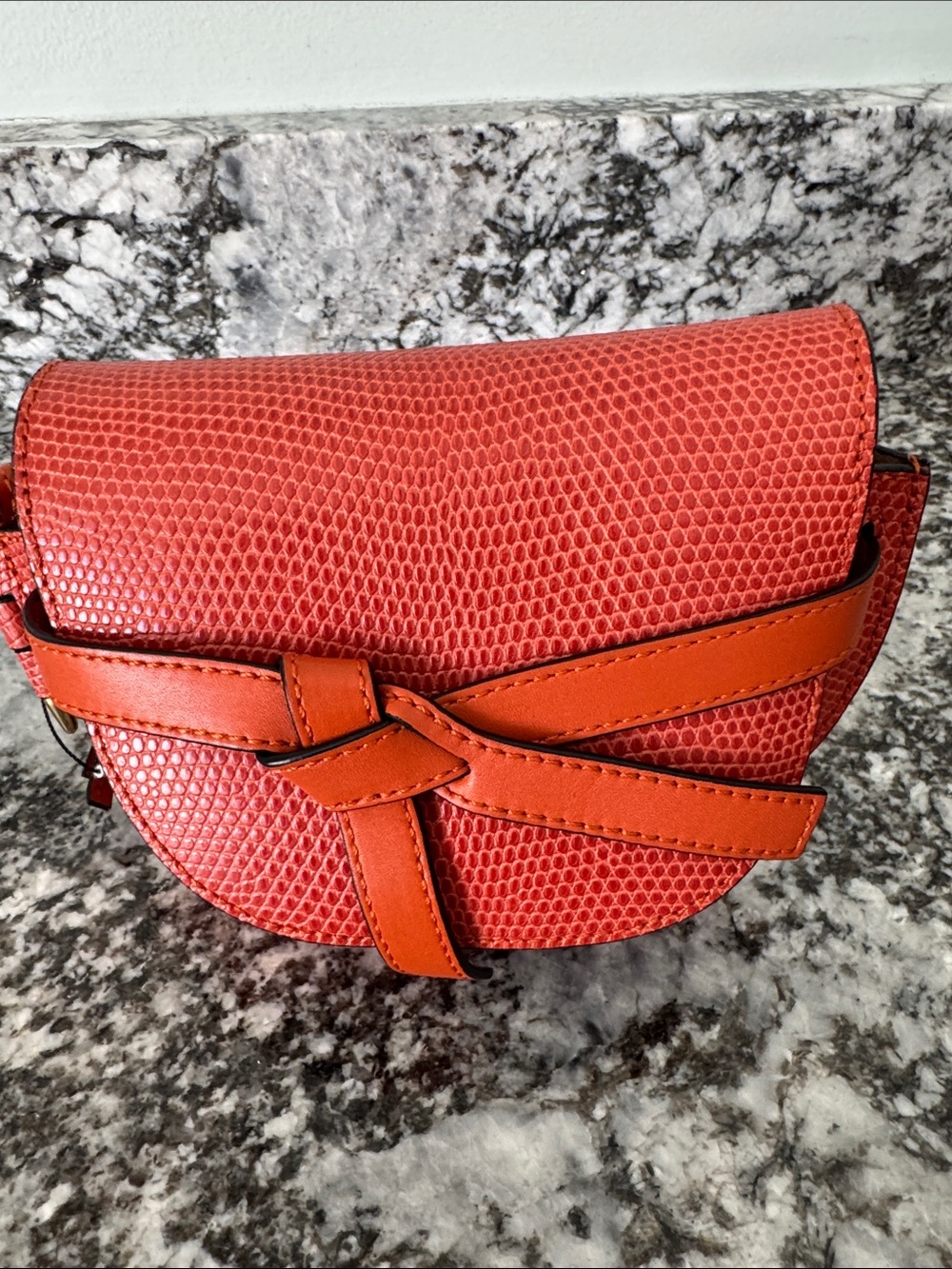 Orange mini loew-e gate bag